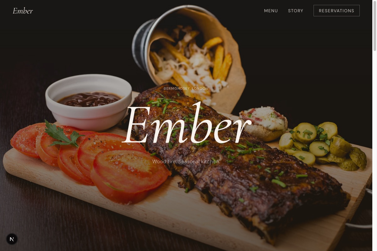 Ember – Wood-fired restaurant – Dark cinematic hero with floating dish photography and parallax depth